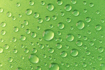 Water drops on green background. Abstract water drops texture.
