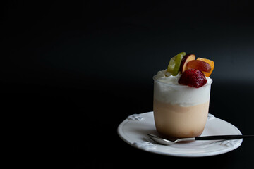 Summertime Dessert , Panna Cotta topped with Exotic Fruits