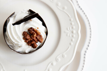 Chocolate Mousse Cake topped with walnut