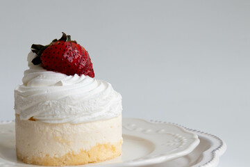 Mini Cheese cake topped with fresh strawberry
