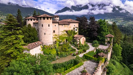 Poster Most scenic medieval castles of Italy - Castel Campo in Trentino region, Trento province. Aerial drone view © Freesurf