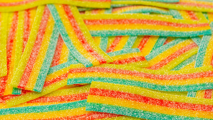 Colorful juicy gummy candies background. Top view. J