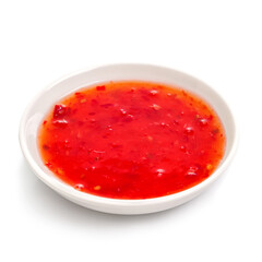 Sweet chilli sauce in a white ceramic bowl on white.
