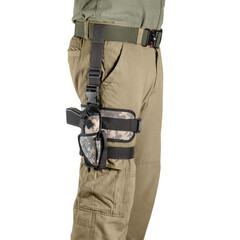Man carrying pistol weapon in holster at hip. Tactical equipment