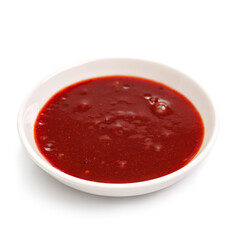 Kimchi sauce in a bowl on a white background. For the restaurant menu.