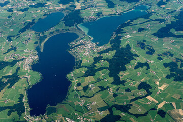 View to a land and clouds from airplane