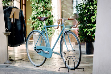 Fototapeta na wymiar Vintage bicycle parked under the arcades
