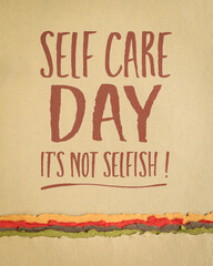 self care day reminder - it's not selfish - text on art paper, mental, emotional, and physical health concept