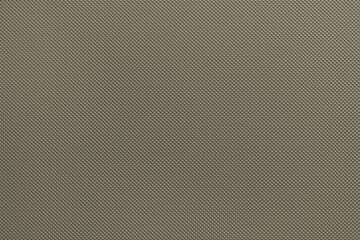 Obraz premium Gray-beige background on pressed metal, embossing, casting