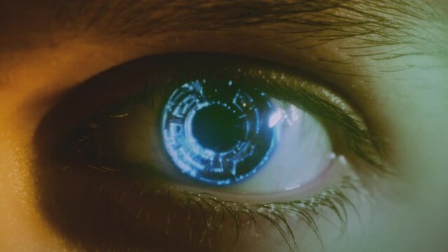 Android eye with glowing cybernetic iris. AI, artificial intelligence concept. Cinematic sci-fi video. High quality 4k footage