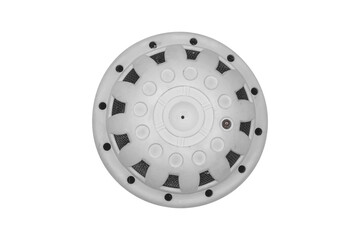 Smoke detector mounted on a suspended ceiling is isolated on transparent background.