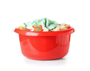 Plastic basin with dirty laundry isolated on white background