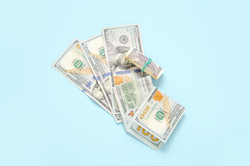 One hundred dollar banknotes on color background