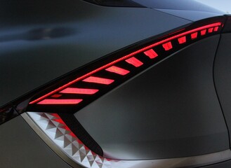 Closeup of LED lights on electric crossover vehicle. 