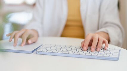 Close-up photo , using the keyboard Electronic devices working, playing social media