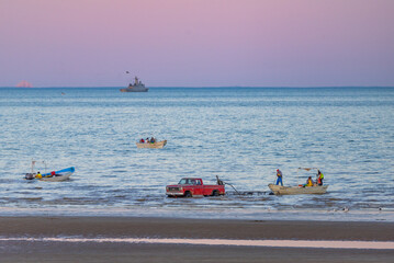 Illegal poachers of totoaba bladder from the totoaba fish coming back from fishing in the port of San Felipe Baja California, Mexico. All of this in front of the Mexican Navy ship  