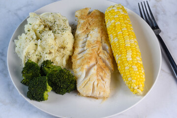 baked cod  with  orn, broccoli and mashed potatoes,