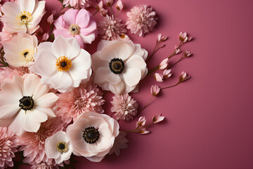 Several white and pink flowers - anemones, daisies and branches on a seamless pastel pink background. Top view. Flat lay. Copy space for text. Generative AI technology - Powered by Adobe