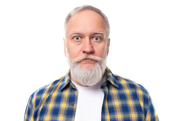 Fototapeta premium well-groomed 60s middle-aged gray-haired retired man with mustache and beard