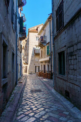 Street view of old city Kotor in Montenegro, medieval european architecture, balkan travel