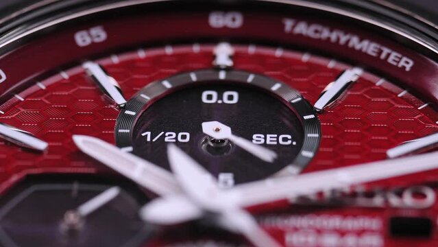 Close Up Of Stylish Luxury Man Wrist Watch With Moving Hand And Multiple Dials. Men's Swiss chronograph watch in metal with sapphire crystal. closeup view of rotating watch , running second arrow