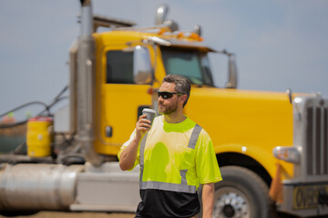 supervisor in hard hat and safety vests drink coffee in building site. supervisor man at...