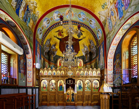 NAZARETH, ISRAEL - JUNE 22,2023:Interior with Iconostasis of the Greek orthodox Church of St George, the wedding church in Kfar Cana Israel. This church is built in the late 19th century