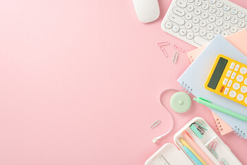 Embrace back-to-school season! Top-down view of stationery, pencil case, calculator, keyboard,...