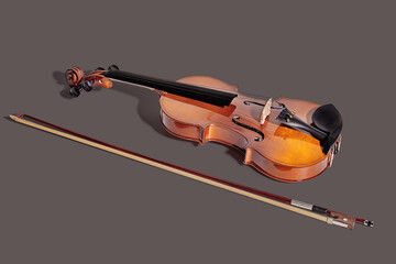 Violin isolated on neutral background. Classical music instrument