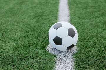 soccer ball in the center of the field at the start of the game