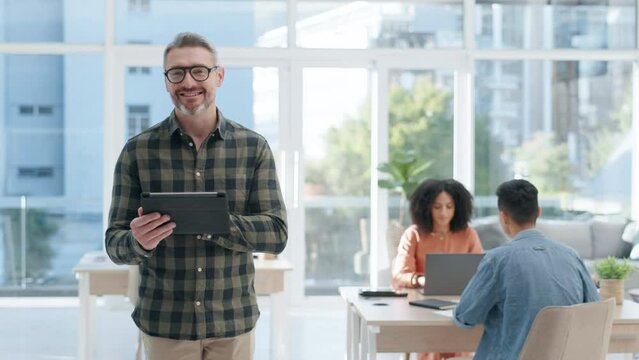 Face, digital tablet and mature business man in office with a smile while typing or checking social media web homepage. Portrait, happy and male ceo online for email, project or schedule management