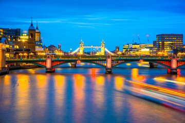 London at night with the view of the Southwark Bridge, and Tower Bridge. This was taken from the Millennium Bridge.  