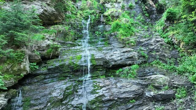 Waterfalls forest virgin nature Vysoky vodopad, aerial drone stream way through stones fairytale summer landscape Jeseniky, beauty untouched primeval forest, crystal clear water wilderness Europe
