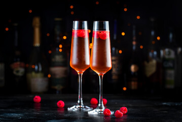 Raspberry Rossini alcoholic cocktail drink with prosecco, cava, or sparkling wine with raspberry...