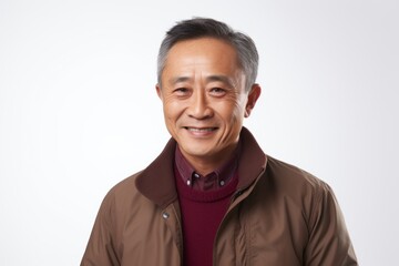 Portrait of a senior asian man smiling and looking at camera