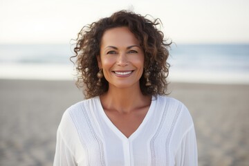 Portrait of a smiling woman on the beach at the day time