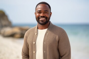 Portrait of a smiling african american man at the beach