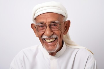 Portrait of a senior asian muslim man smiling at the camera