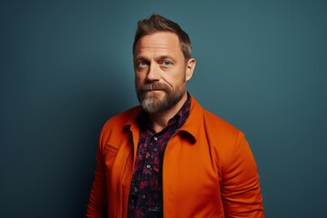 Obraz premium Group portrait photography of a pleased Russian man in his 40s wearing a chic cardigan against an abstract background 