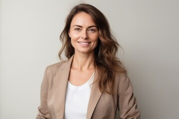 Fototapeta premium Medium shot portrait photography of a pleased Russian woman in her 30s wearing a chic cardigan against a minimalist or empty room background 
