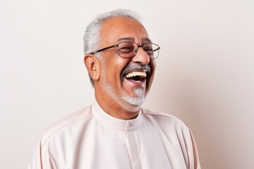 Fototapeta premium Portrait of a senior asian muslim man wearing eyeglasses