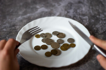 Kazakh money. Tenge coins. Coins on plates