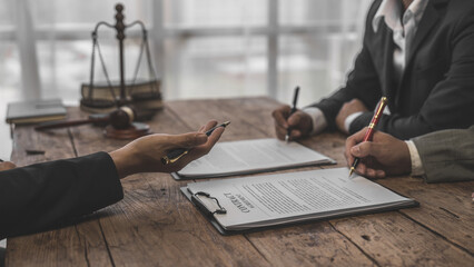 Full concentration at work. correctly sign contracts with clients, Sign and Execute Binding Contracts, contracts jargon, legal terms and definitions, signed by unauthorised person