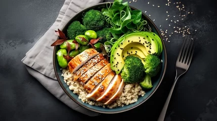 Foto op Canvas Healthy buddha bowl lunch with grilled chicken, quinoa, spinach, avocado, brussels sprouts, broccoli, red beans with sesame seeds. Top view © Salsabila Ariadina