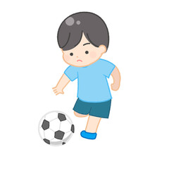 サッカーをする少年
