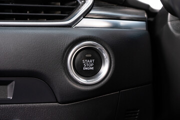 Close up engine car start button. Start stop engine modern new car button,Makes it easy to turn...