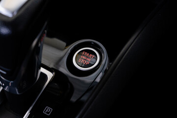 Close up engine car start button. Start stop engine modern new car button,Makes it easy to turn...