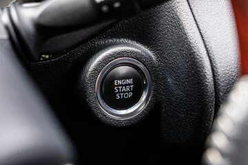 Close up engine car start button. Start stop engine modern new car button,Makes it easy to turn...