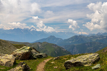 Fototapeta na wymiar Summer trekking day in the mountains over Valtournanche