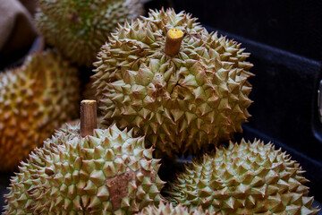 Naklejka na ściany i meble Close-up of durian for sale at market stall